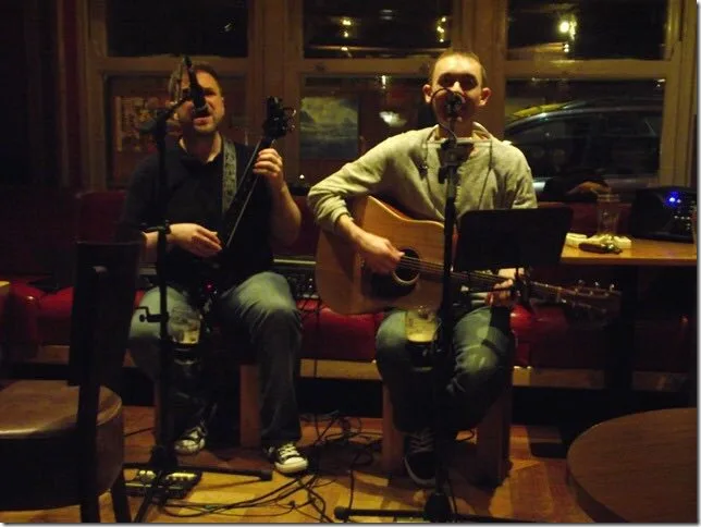 Dave and Tom performing together in an intimate venue